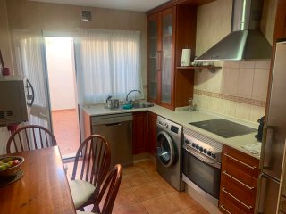 Cocina modular madera y cristal