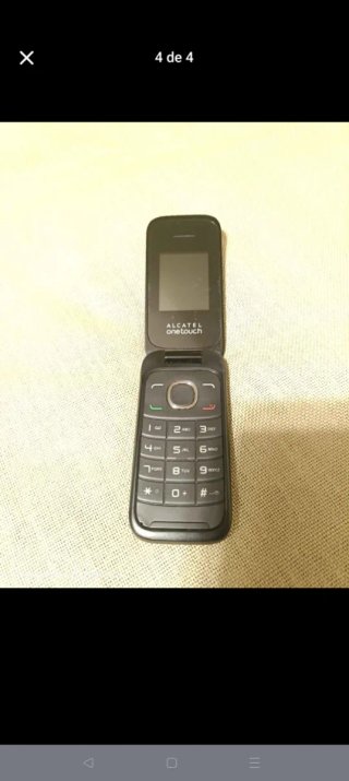 Móvil Alcatel One Touch con Cargador