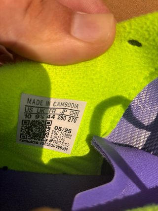 Botas de fútbol Adidas moradas y verdes