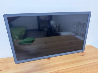 Televisor LG 32 con mando y soporte de pared