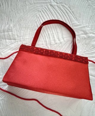 Bolso de fiesta rojo Benini. Nuevo sin usar