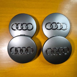 TAPABUJES AUDI 60mm GRIS - EMBLEMA LLANTAS AUDI