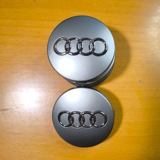 TAPABUJES AUDI 60mm GRIS - EMBLEMA LLANTAS AUDI