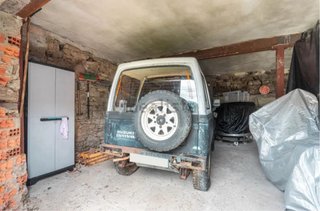 Cocheras con parcela en entorno rural