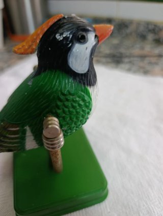 Mechero antiguo pájaro