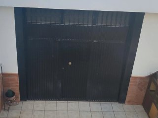 Portón de hierro plegable