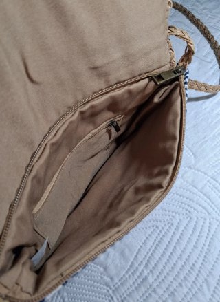 Bolso de mano tejido beige y azul