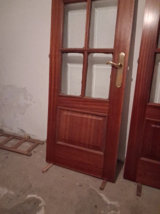 Puerta sapelly acristalada