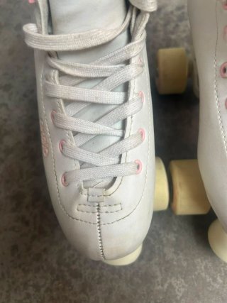 Patines Oxelo blancos y rosas