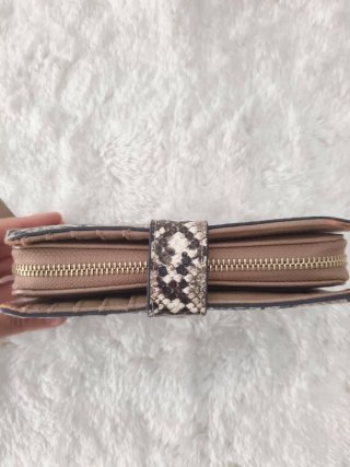 Cartera estampado animal print Parfois