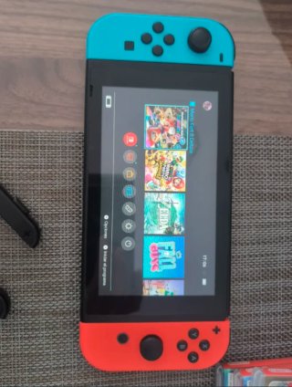 Nintendo Switch + 4 Juegos