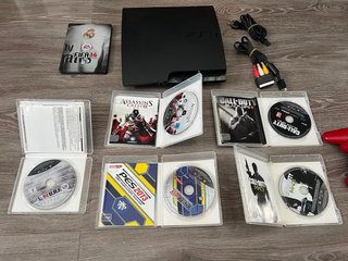 Consola PS3 Slim Negra + 5 Juegos