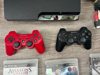 Consola PS3 Slim Negra + 5 Juegos