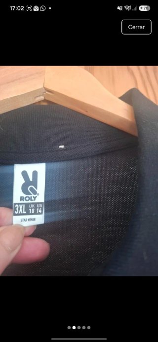 Polo negro Mujer T M/L .Sin estrenar .