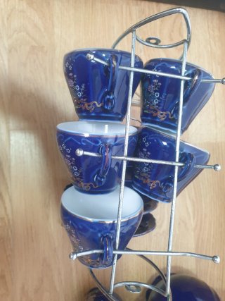 Juego de café azul y dorado