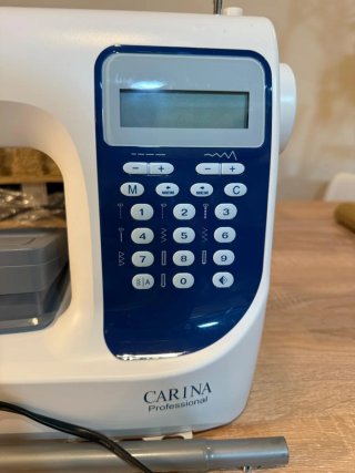 Máquina de coser profesional carina