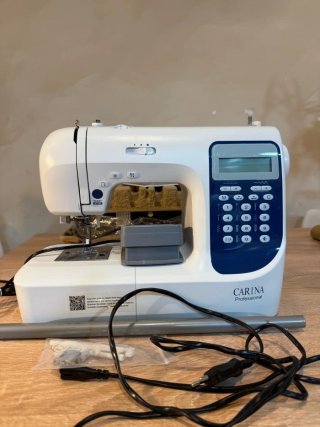 Máquina de coser profesional carina