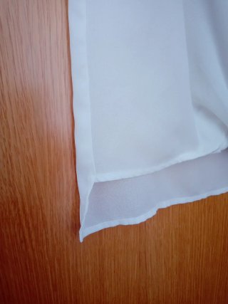 Camisa blanca sin mangas