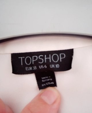 Camisa blanca sin mangas