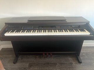 Piano Yamaha Clavinova CVP-103 Con banqueta