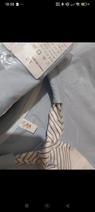 Blusa elegante azul con pañuelo