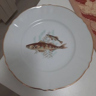 Piatto decorativo con pesci dorato