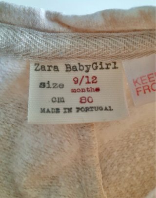 Sudadera beige niña muñeca flores