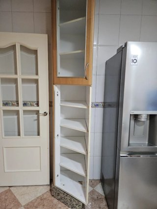 Muebles de cocina beige y marrón