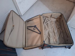 Maleta Samsonite Vintage verde y marrón.