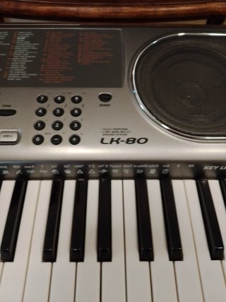Piano Casio LK-80 en perfecto estado