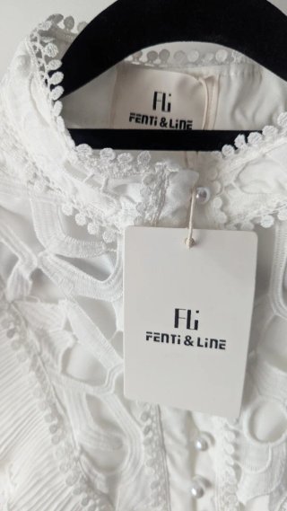 Camisa blanca volantes troquelada