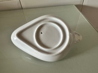 Exprimidor de cerámica blanco