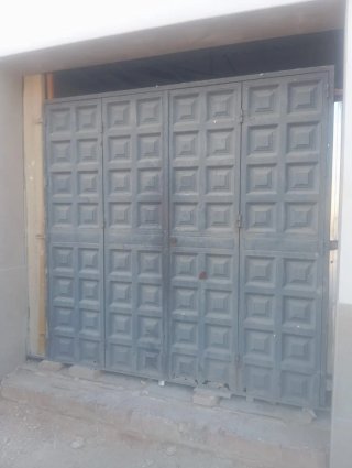 Puerta de garaje plegable