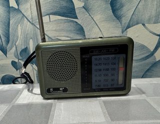 Mini radio portátil Tuoxiang