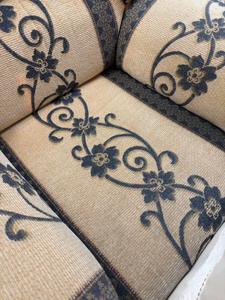 Sillón individual tapizado floral