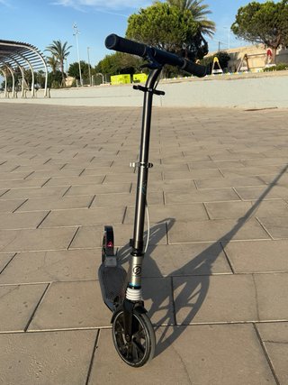 Patinete Oxelo gris en perfecto estado