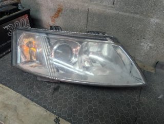 Faros Xenón Saab 9-3 (02-07) Originales Hella