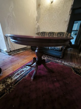 Mesa de comedor redonda de madera