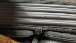 Bandolera gris
