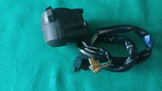 Piña luces derecha Kymco Grand Dink