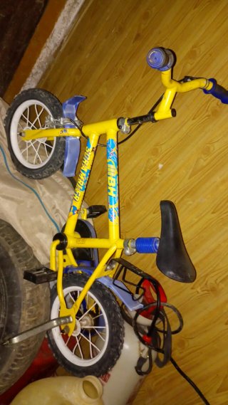 Bicicleta infantil amarilla Scrambler