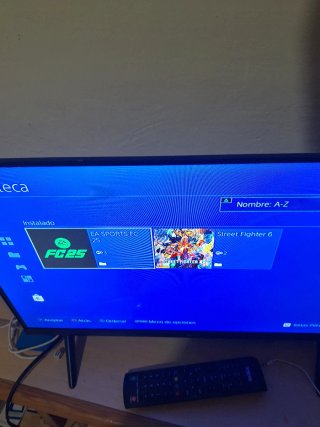 PS4 + 3 mandos + cables + juegos