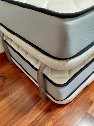 Cama nido tela gris y blanca