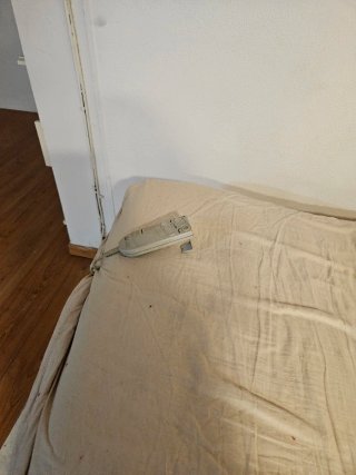 Cama articulada eléctrica beige y negra