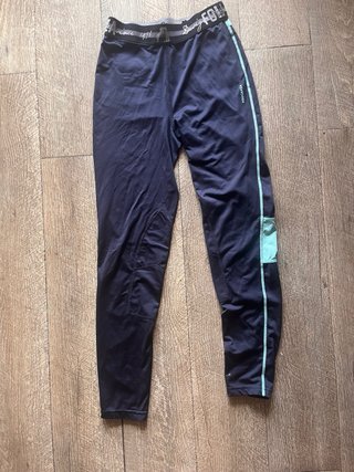 Pantalones equitación Fouganza azul y turquesa