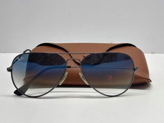 gafas de sol caballero/unisex rayban ilegible