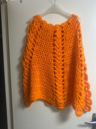 Poncho tejido naranja