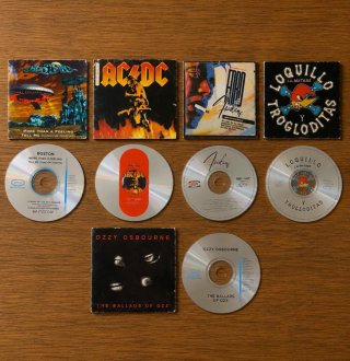 Lote 5 CD Singles Rock: Ozzy, AC/DC, Boston