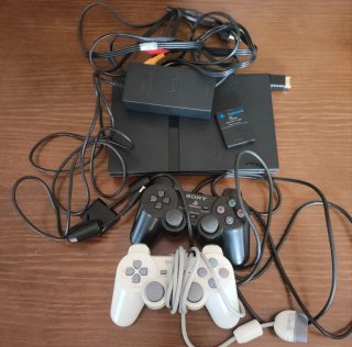 PlayStation 2 Slim Negra + Accesorios