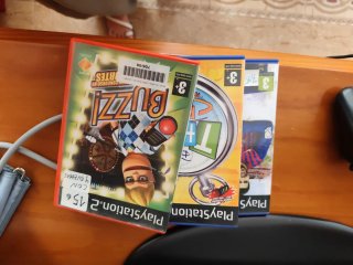 Consola PlayStation 2 Negra, mando y tres juegos
